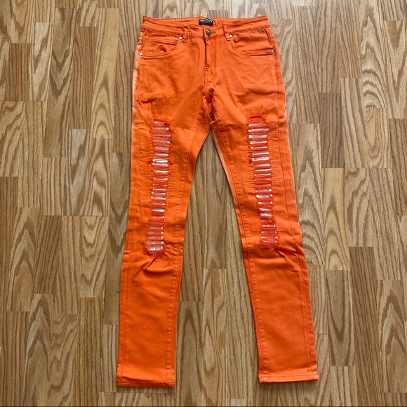 orange ripped jeans